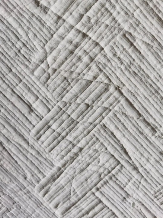 石材肌理面：建筑表皮的个性 “纹身”，重塑空间格调