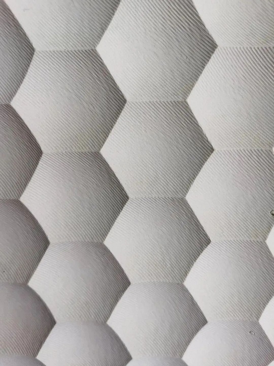 石材肌理面：建筑表皮的个性 “纹身”，重塑空间格调