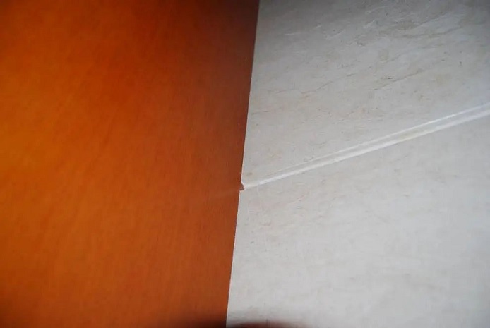 微信图片_20231118091908.jpg 原来墙面石材与木饰面交接还可以这样收口,全是细节!